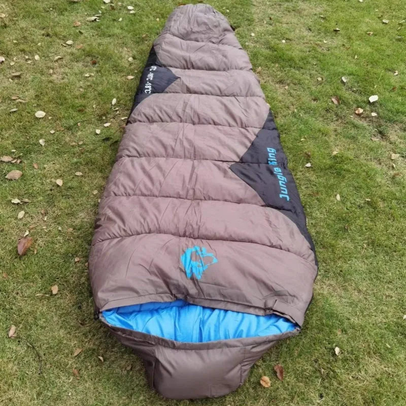 Camping sleeping bag with compression sack in Army Green colour for winter use.