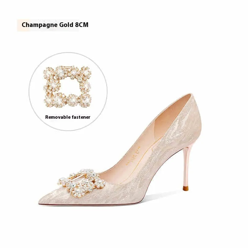 Champagne gold pointed toe stiletto high heel pumps with slip-on closure on a plain background.