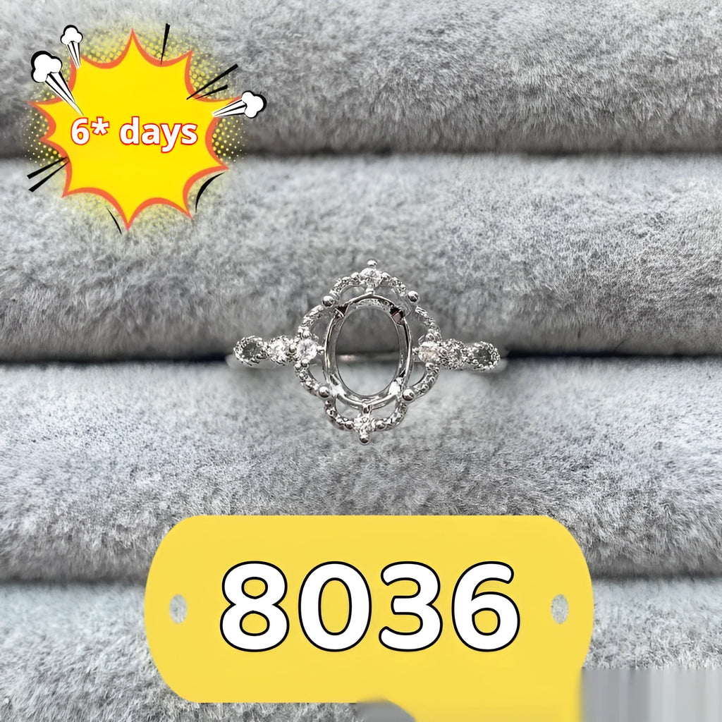 Oval denier open mouth ring with 6x8mm stone and five-pointed star on copper band.