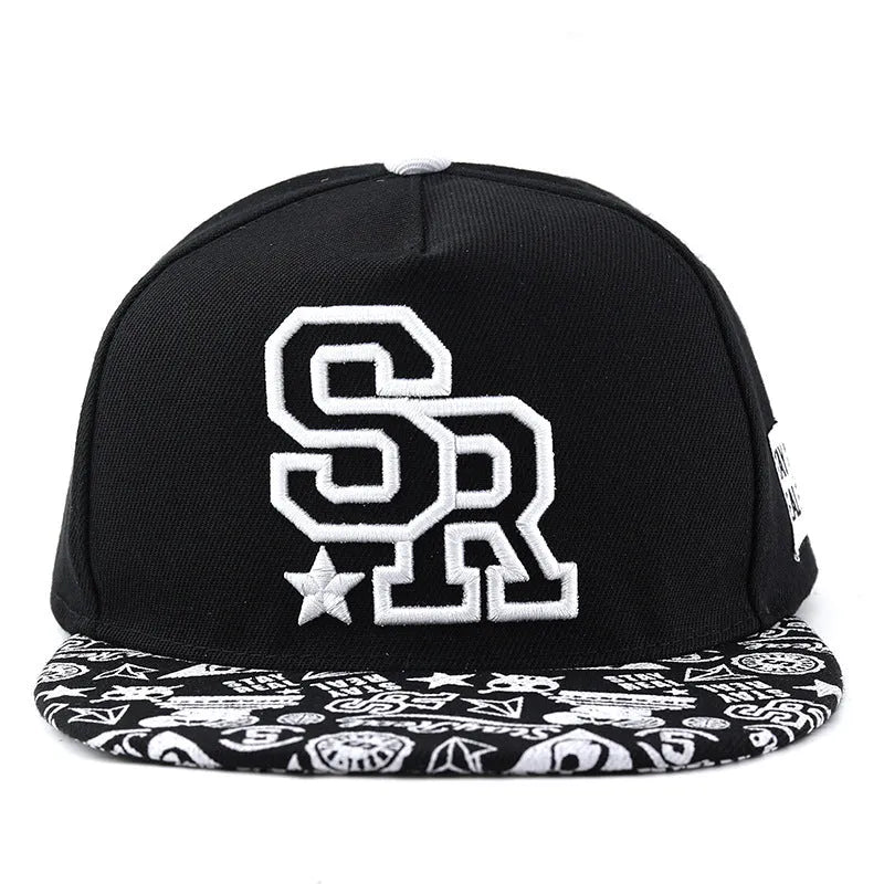 Cotton baseball cap with embroidered lettering in black or white with adjustable strap