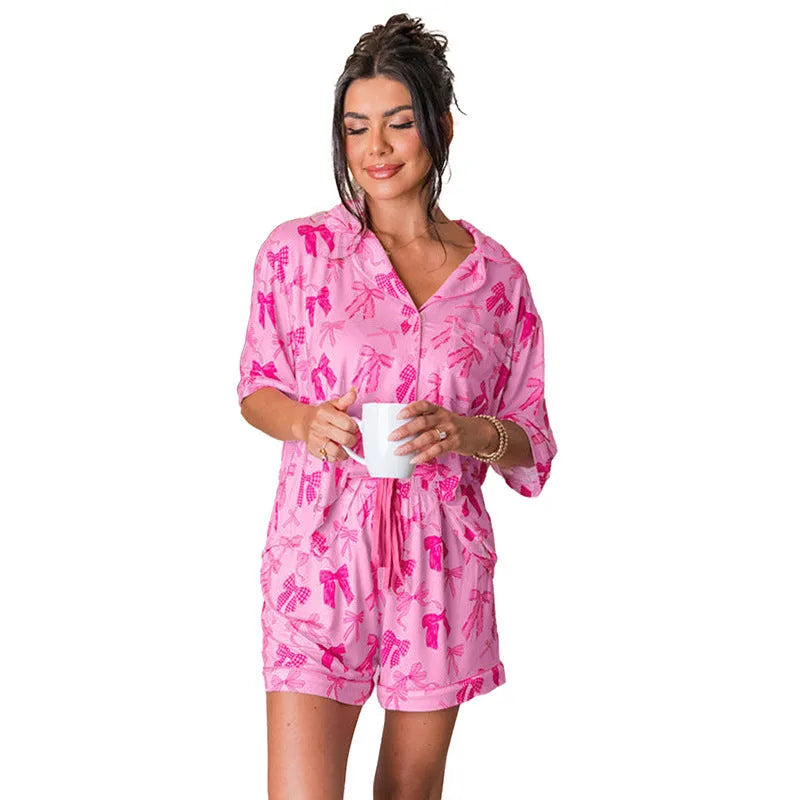Pink bow print polyester pajama set with short sleeves and trousers for sleepwear