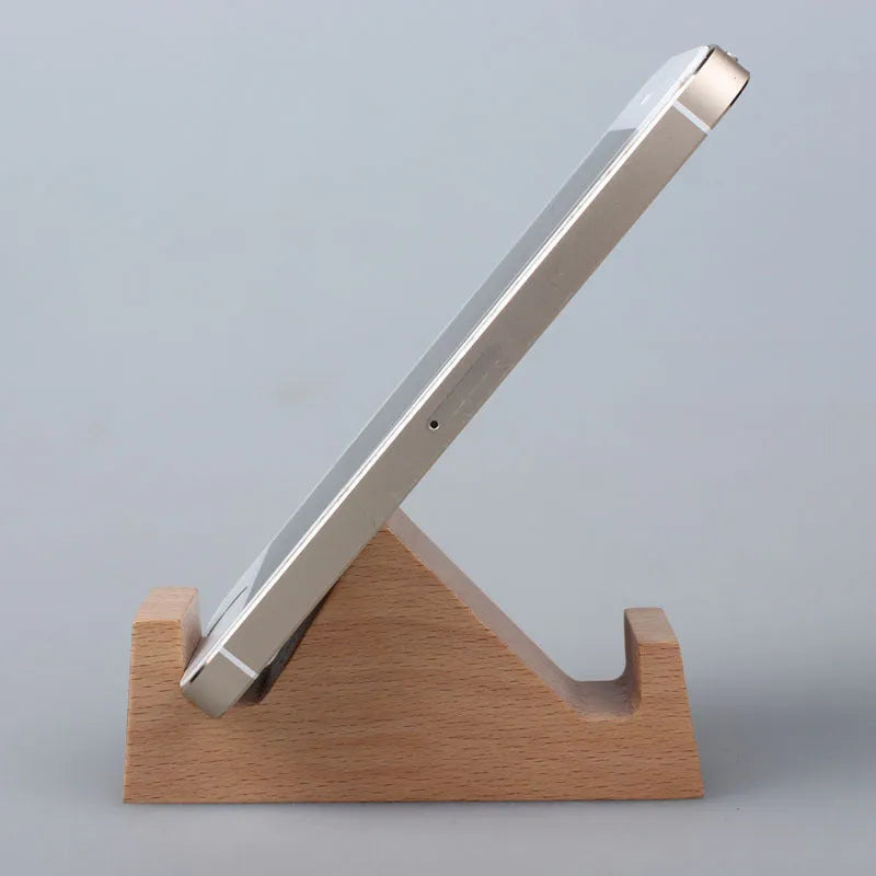 Decorative resin mobile phone stand in a choice of styles including animal figures and wood-effect designs.