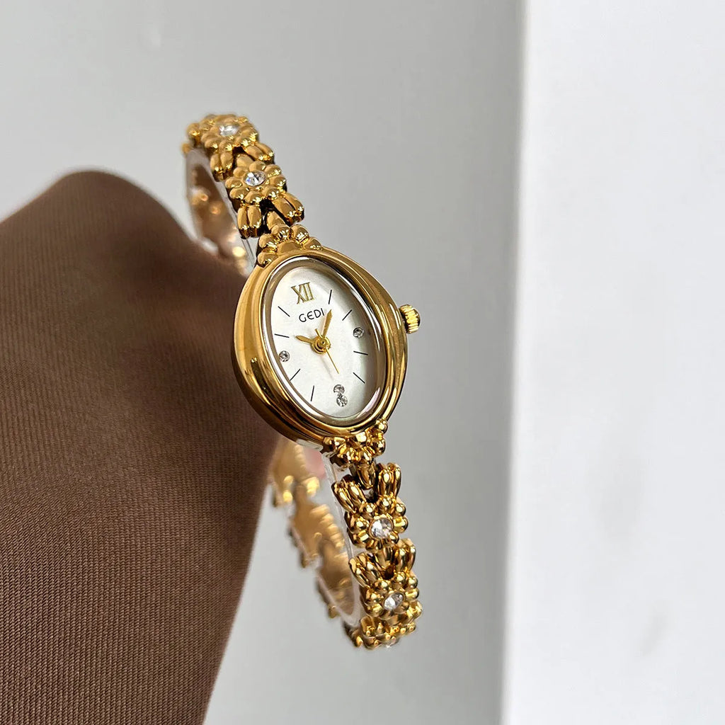 Women's light luxury retro compact alloy watch with 8mm thin case and white dial on white strap