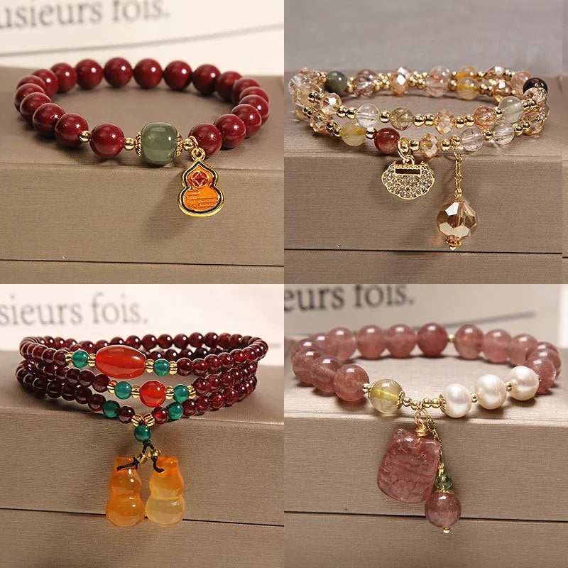 Natural garnet multi-layer crystal bracelet with strawberry quartz, moonstone, and pendant details in Korean light luxury style