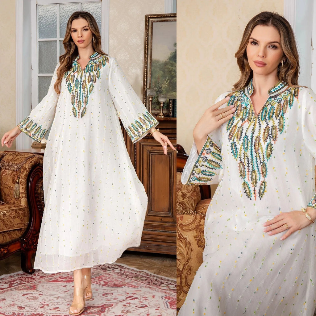 White traditional Dubai Arabic robe with long sleeves and floor-length design