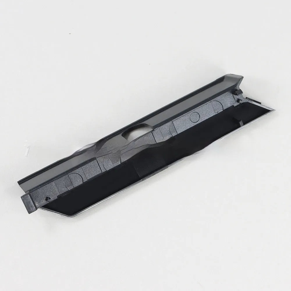 Black and white plastic hard disk baffle bin cover for internal drives.