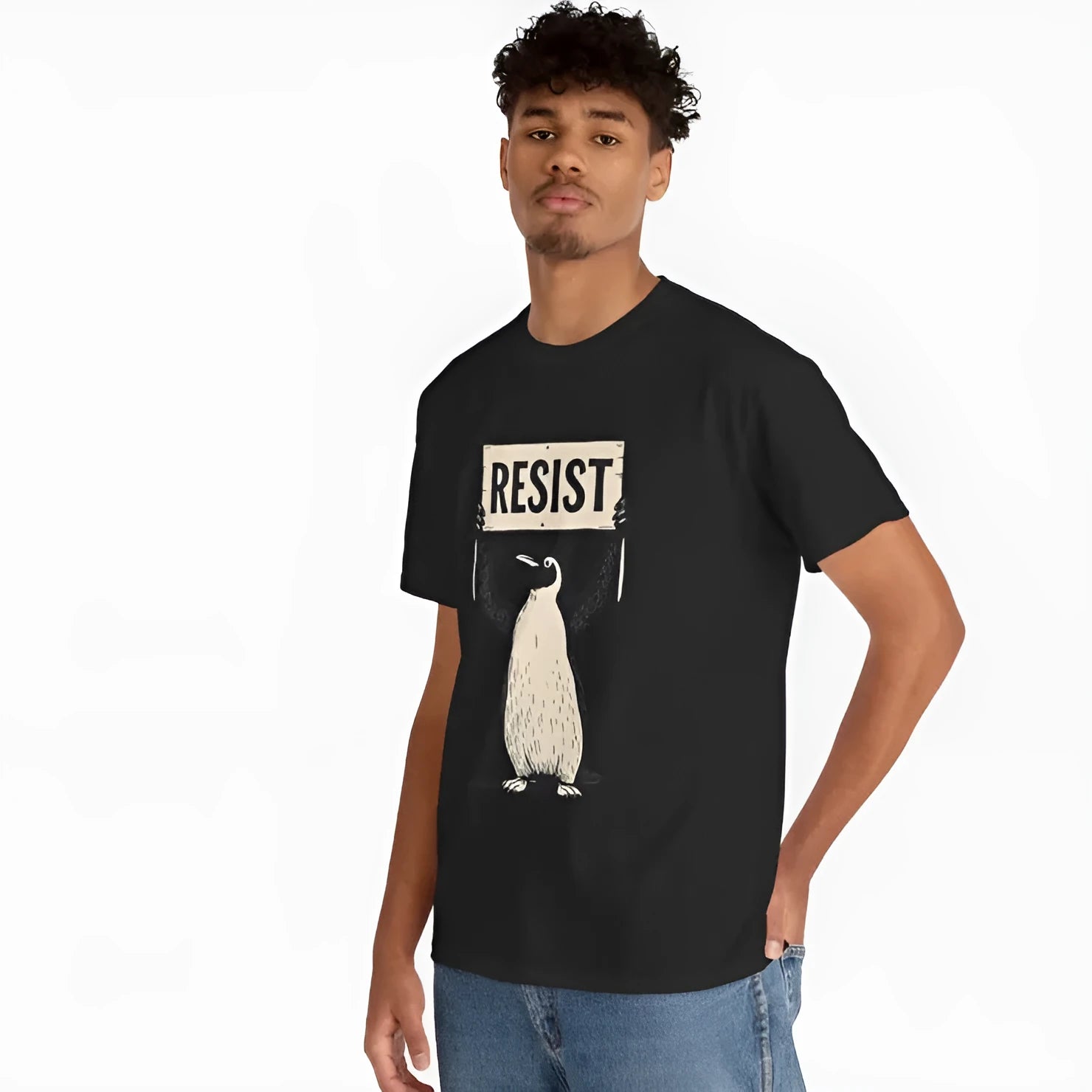 A loose-fitting black short-sleeved cotton t-shirt with a round neck on a hanger.