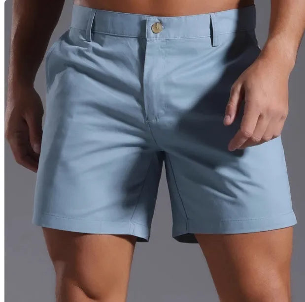 Men's straight-cut casual sports shorts in a solid colour, showcasing the micro-elastic cotton blend fabric.