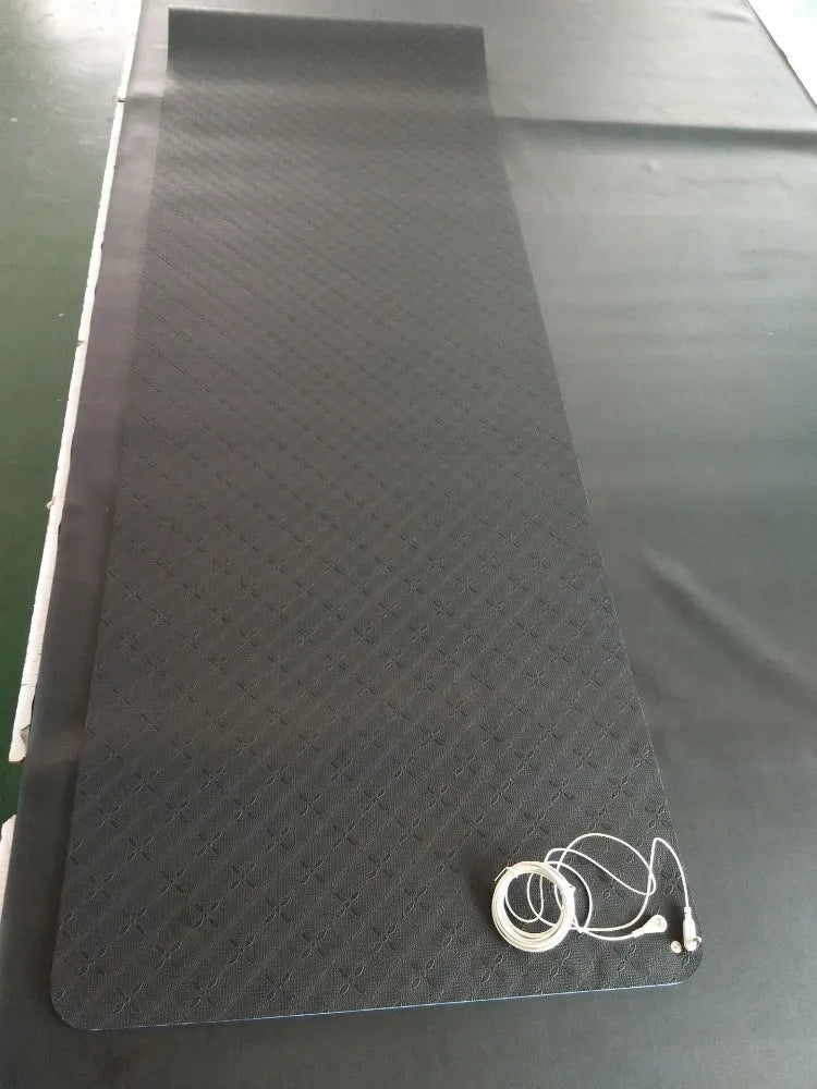 Blue conductive yoga mat with botanical plant pattern, grounding wire, and non-slip surface measuring 182x61cm