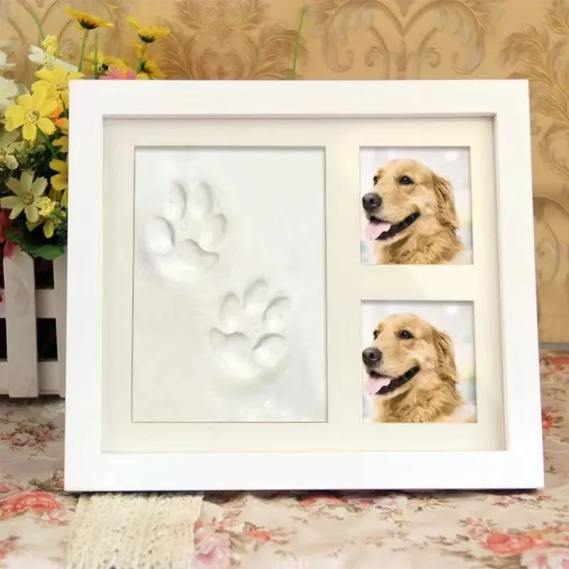 Black and white pet paw print photo frame with plaster moulding kit for DIY commemorative keepsakes