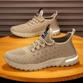 Men's mesh casual shoes in army green colour showing solid colour design and casual styling