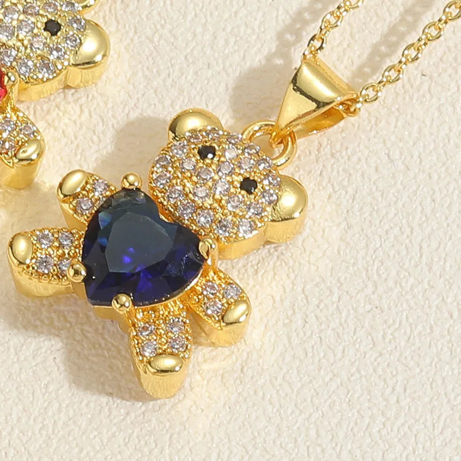 Copper micro inlaid zircon bear love gem necklace in green on a white background, adjustable 41-50cm