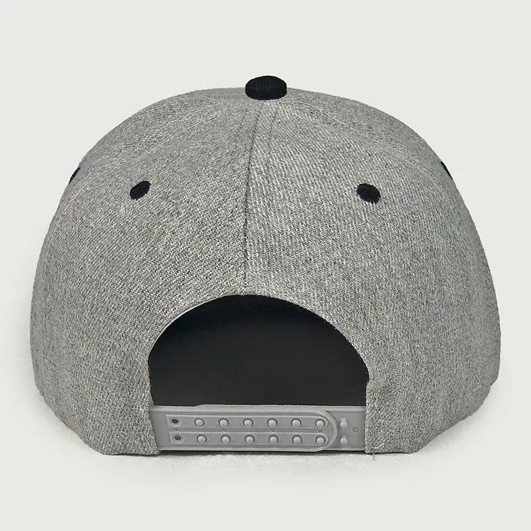 Adjustable cotton twill baseball cap in black with big flat eaves and monochrome letter detail