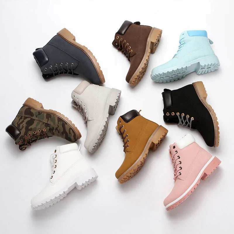 Men's pink high-top Martin boots with velvet lining, round toe, and front lace-up closure on a flat sole.