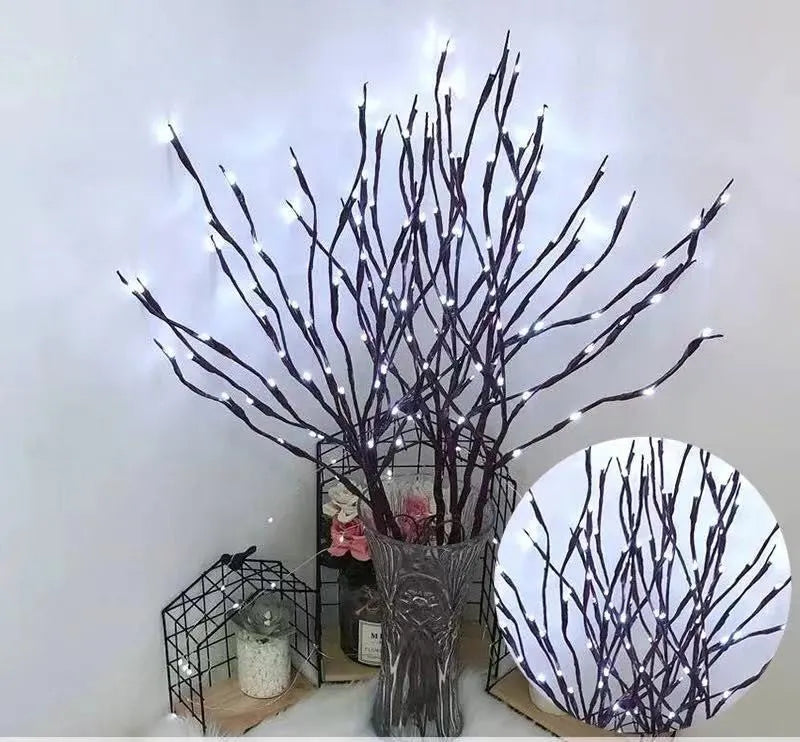 LED decorative tree light in a vase with silver branches illuminated in a choice of six colours.