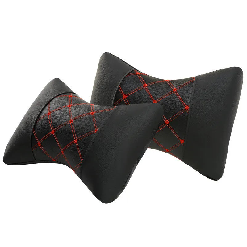 Quilted diamond-pattern black leather car headrest pillow for neck support.
