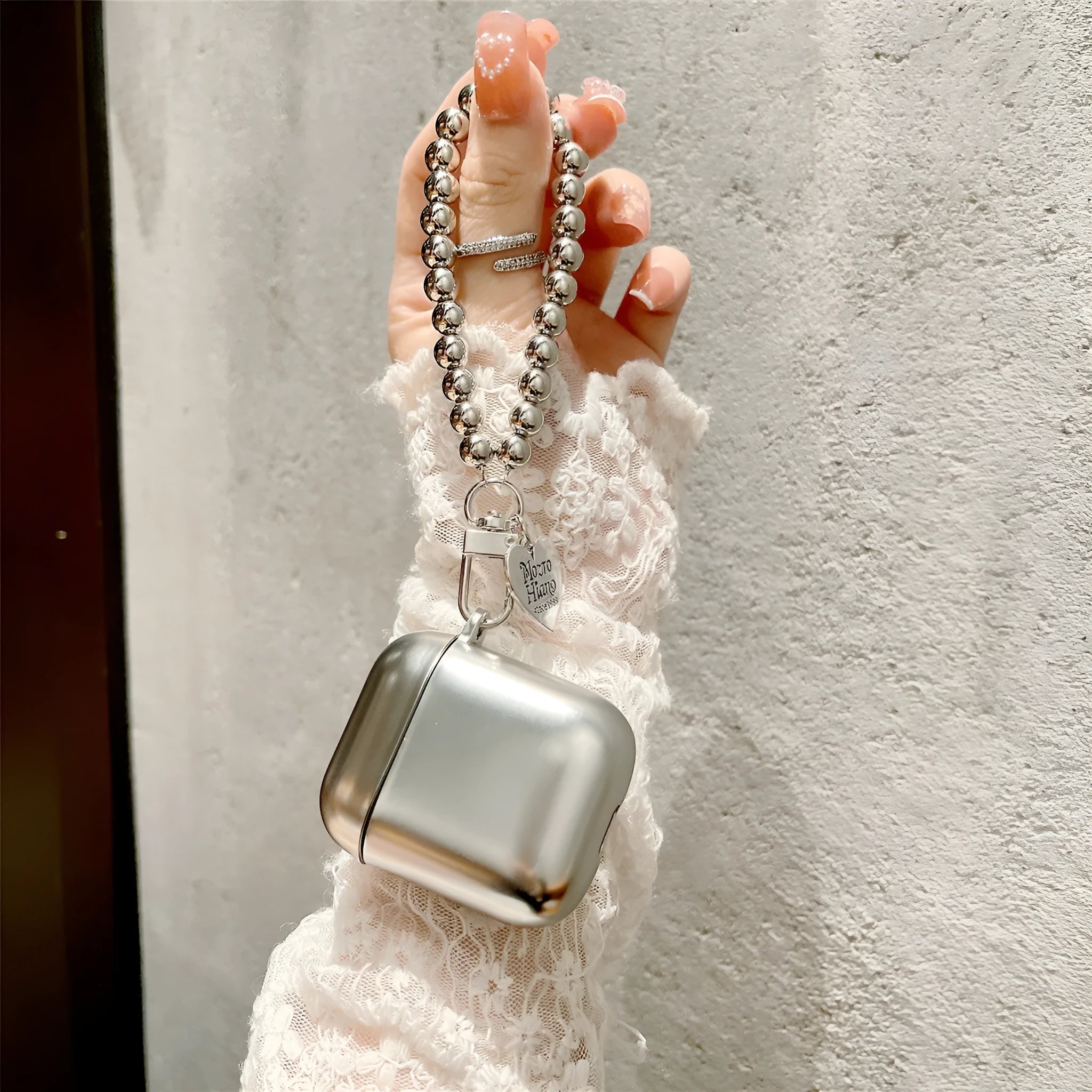 Matte plating TPU protective cover case for Apple AirPods shown in electroplated finish