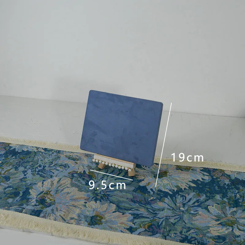 Handmade plaster jewellery display tray with necklaces and bracelets on a countertop