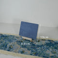 Handmade plaster jewellery display tray with necklaces and bracelets on a countertop