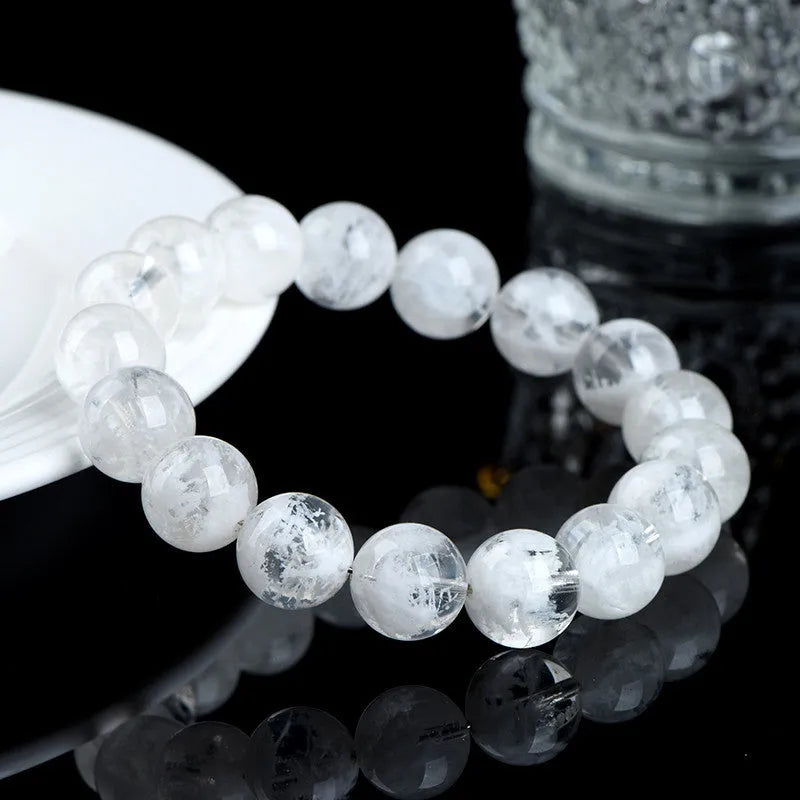Women's crystal bracelet with natural blizzard snowflake round beads in geometric design with traditional elements