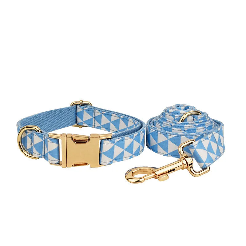 Blue cloth dog vest with triangular rope design, matching collar, leash and bow in a four-piece pet accessory set