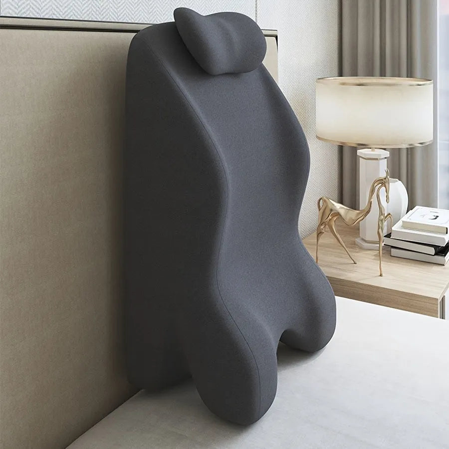 Stomach sleeper pillow for prone positioning shown in blue, dark grey, green, and light grey colour options.