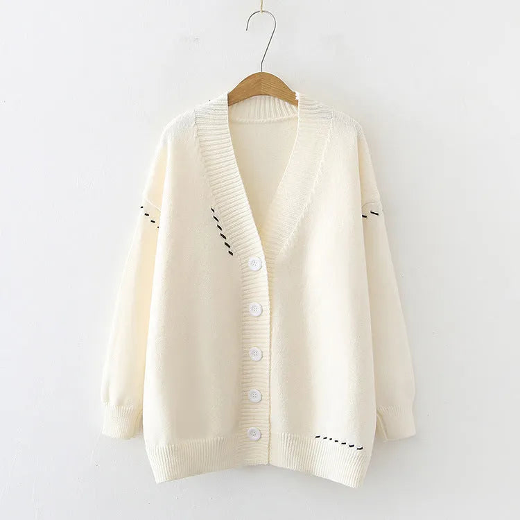 Women's loose fit knitted cardigan top coat in black or white colour