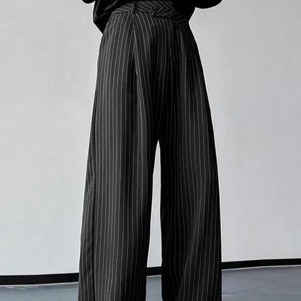 Black men's trousers with vertical stripes, front pleats, and a soft rabbit hair bamboo fibre fabric blend.