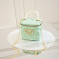Women's white PVC bucket gel handbag with a red heart-shaped pattern lining.