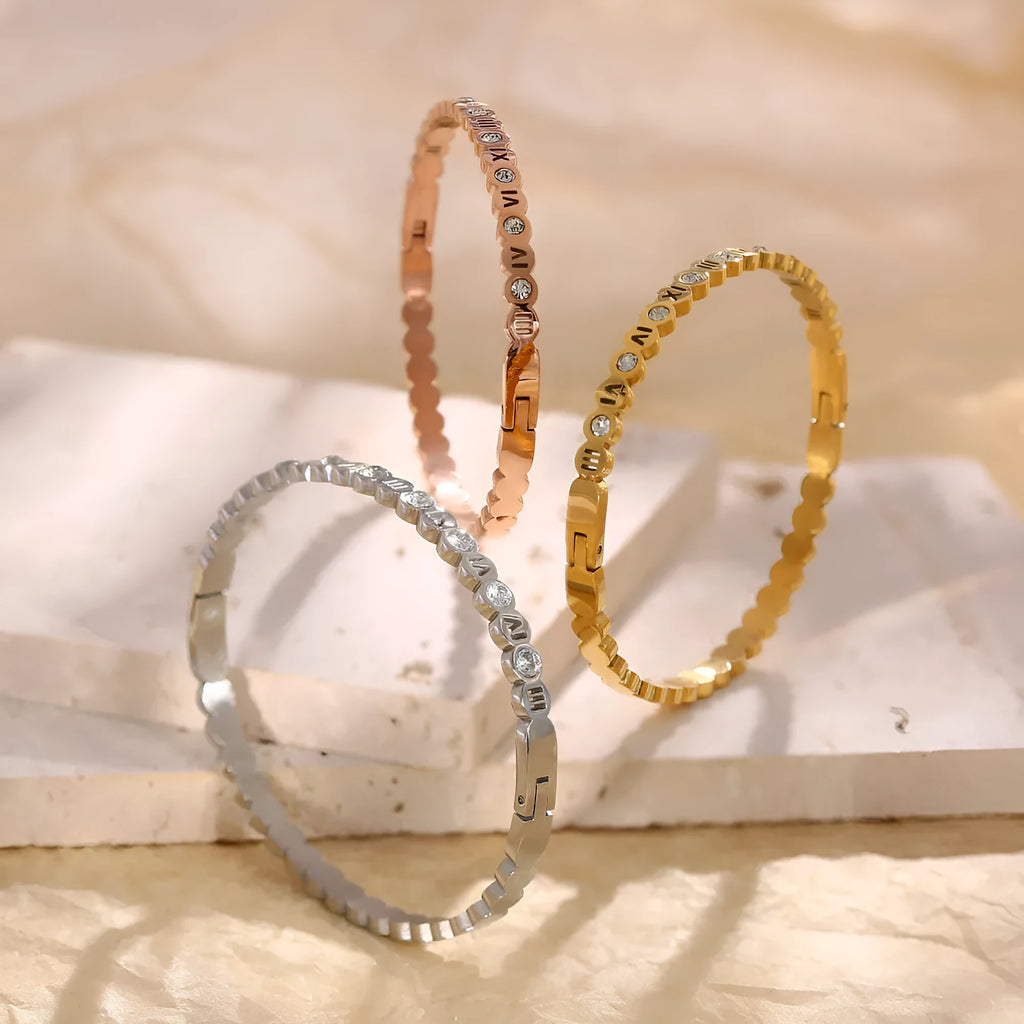 Korean style titanium steel bracelet with number detail in a choice of gold, rose gold, or steel colour.