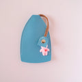 Black PU leather universal car key case with large capacity and anti-theft storage.