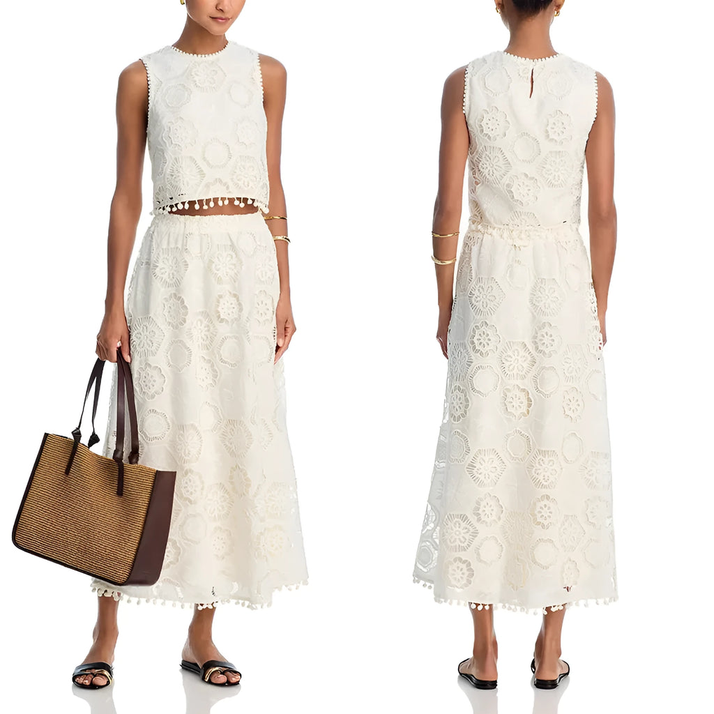 White women's polyester two-piece suit with embroidered retro art design, featuring sleeveless top and long skirt