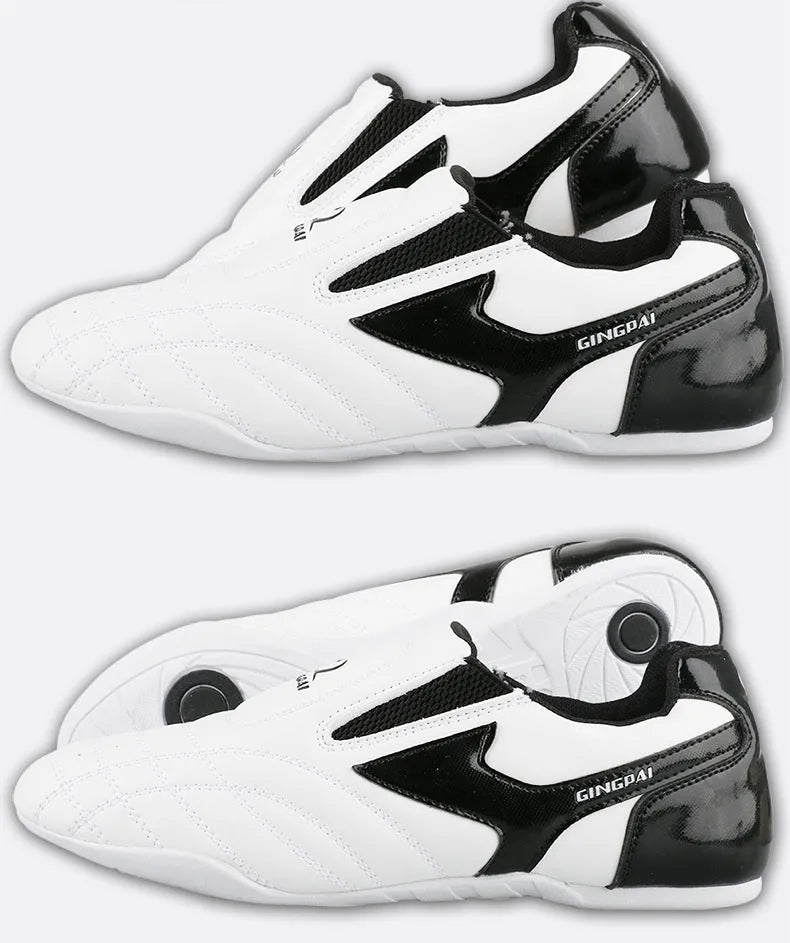 Black and white children's Sanda martial arts training shoes with a soft sole, shown with a shoe bag and socks.