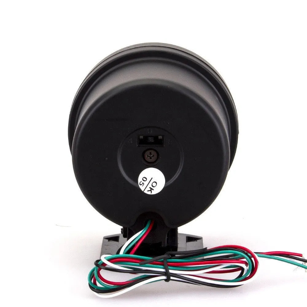 Black automotive tachometer with blue light pointer on a 0-8000 RPM scale