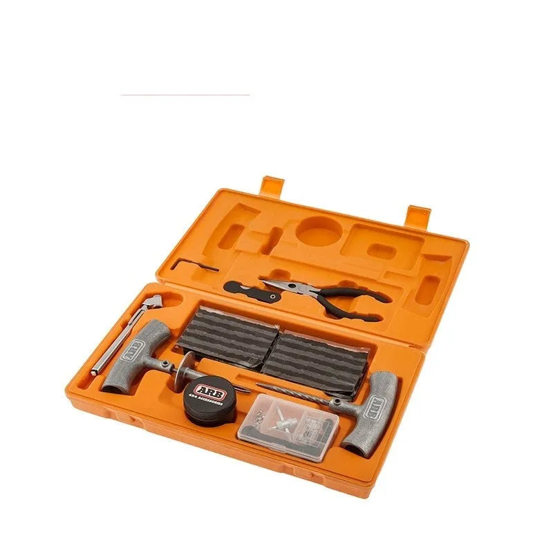 Speedy Seal emergency car tyre repair tool kit in a compact case with hex wrench, knife, pressure gauge, pliers, and reamer tools.
