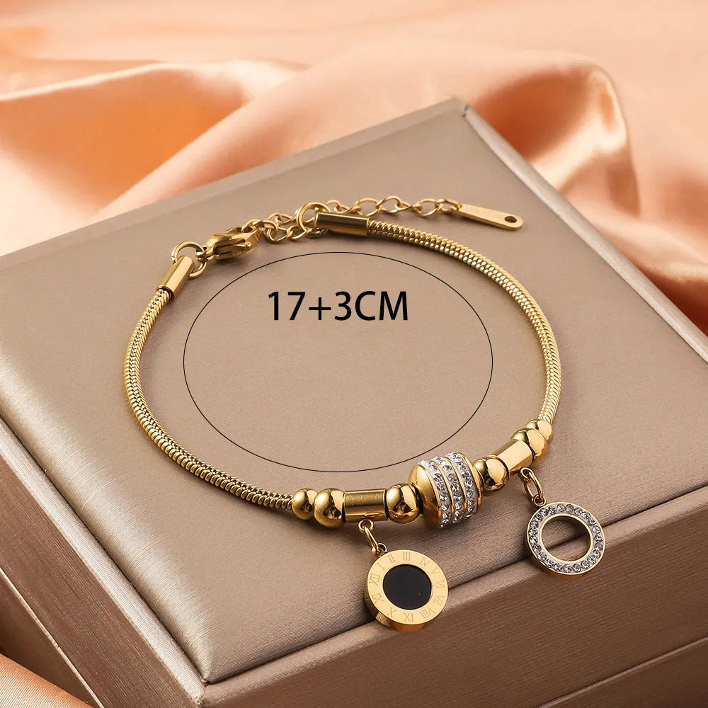 Titanium steel bracelet with electroplated colour and an inlaid shell design, showing pattern options like a five-pointed star.