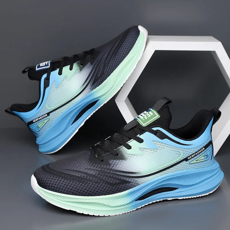 Men's low-top casual shoes in mesh with round toe and rubber sole, shown in black, blue, and grey-green colours.