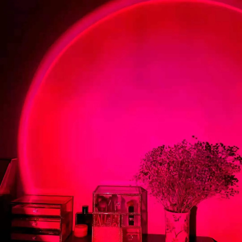 USB rechargeable rainbow sunset projection lamp with push-button control creating colourful atmospheric lighting