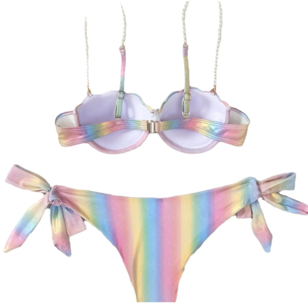 Women's rainbow shell bikini swimsuit with adjustable ties on top and bottom.