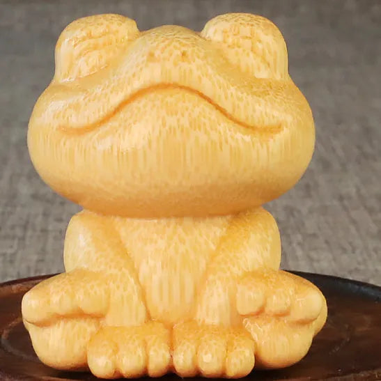 Solid bamboo carving ornament with smiling frog cartoon design, 5cm height