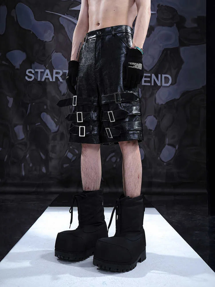 Men's black casual shorts with leather ring detail on PU leather panels