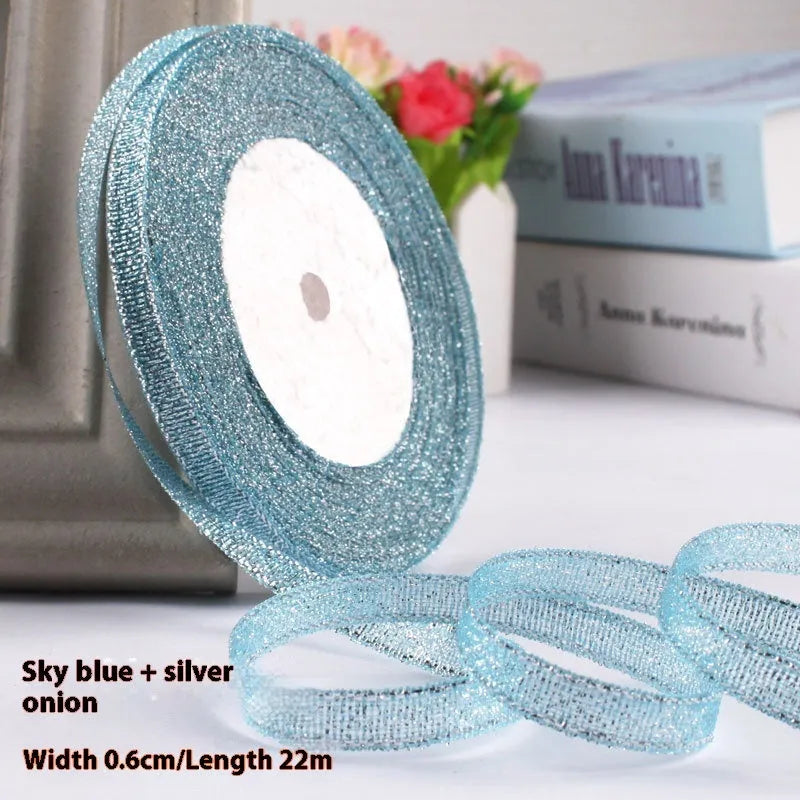 Roll of 0.6cm wide polyester gift ribbon in a choice of colours, with 22 metres per roll.