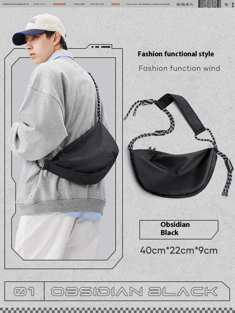 Men's lightweight nylon messenger bag in a choice of colours showing large capacity design.