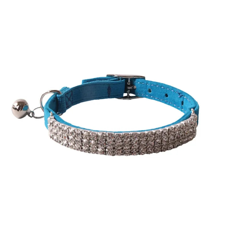 Soft flocking cat collar with an elastic buckle, shown in pink, black, red, blue, purple, and dark brown.