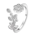Women's open ring with diamond flower and leaf design in gold or white colour on copper material
