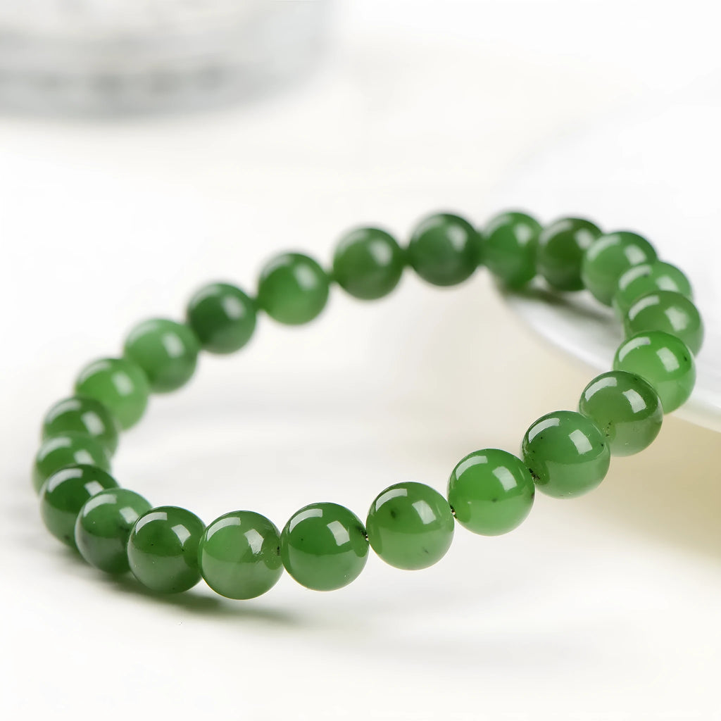 Polished Hetian jade jasper ball bracelet in five bead size options from 4mm to 12.8mm