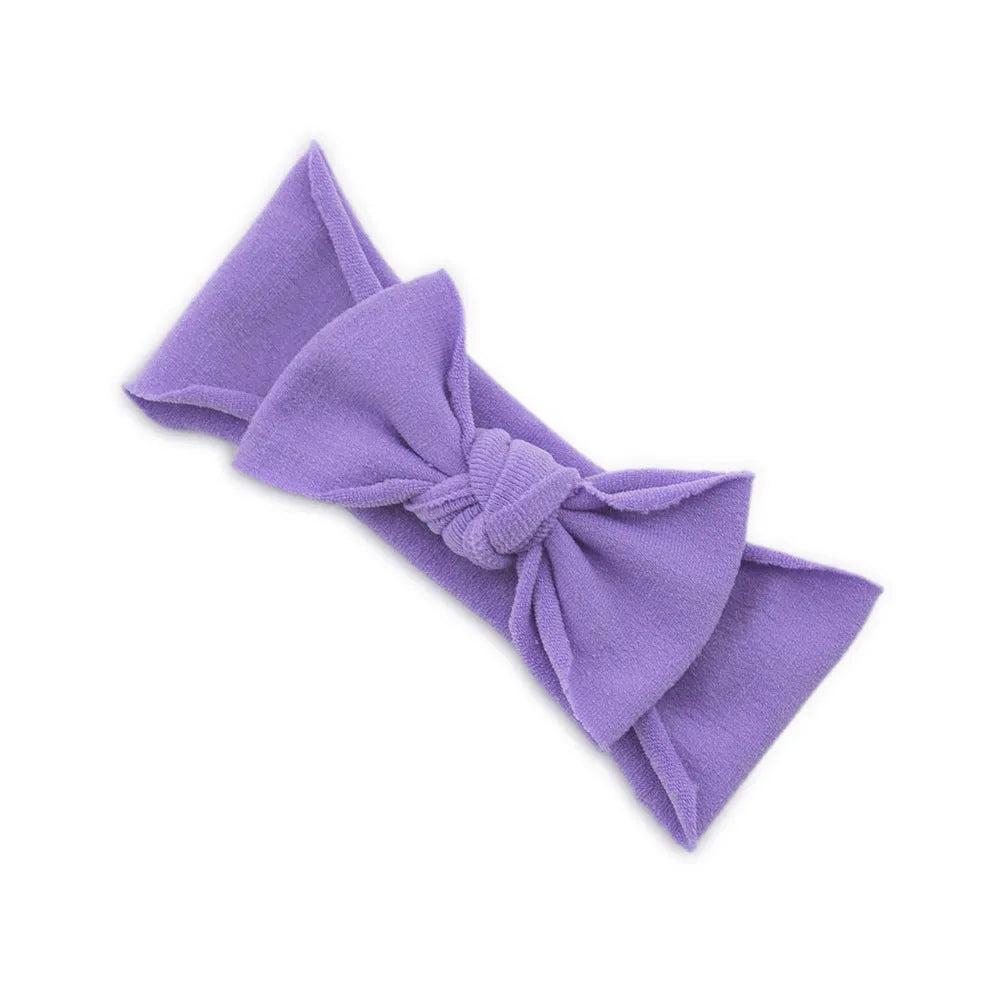 Solid colour knotted cloth headband for baby girls with bowknot design, available in 37 colours