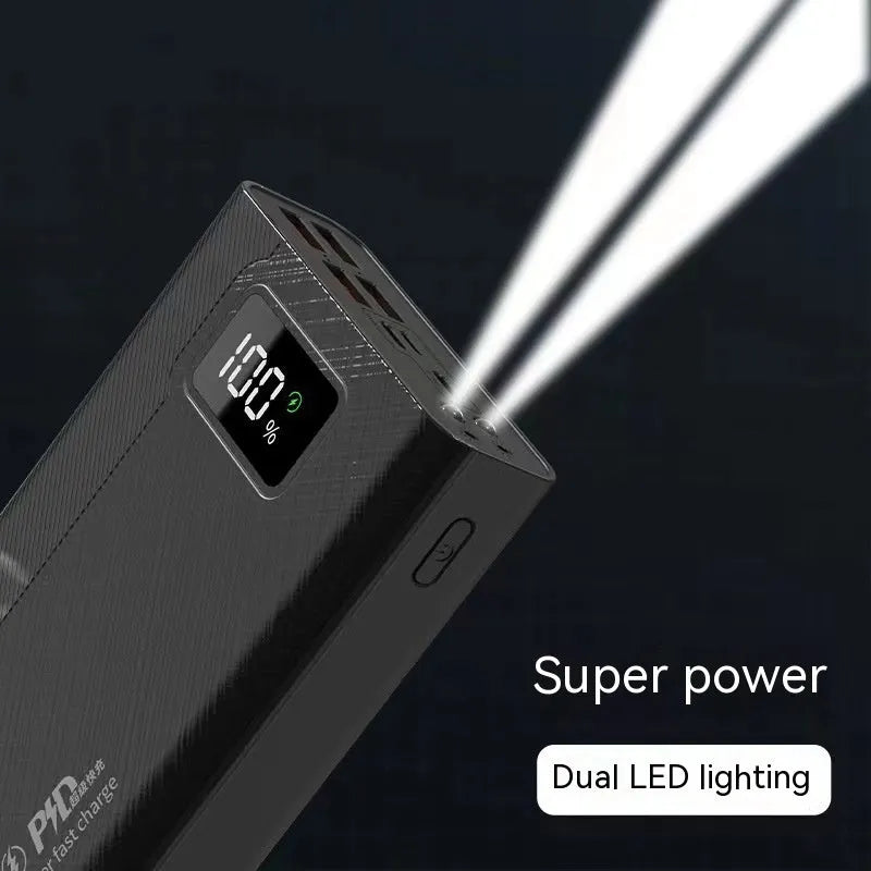 Large black and white plastic power bank showing front view with capacity options from 20000mAh to 50000mAh.