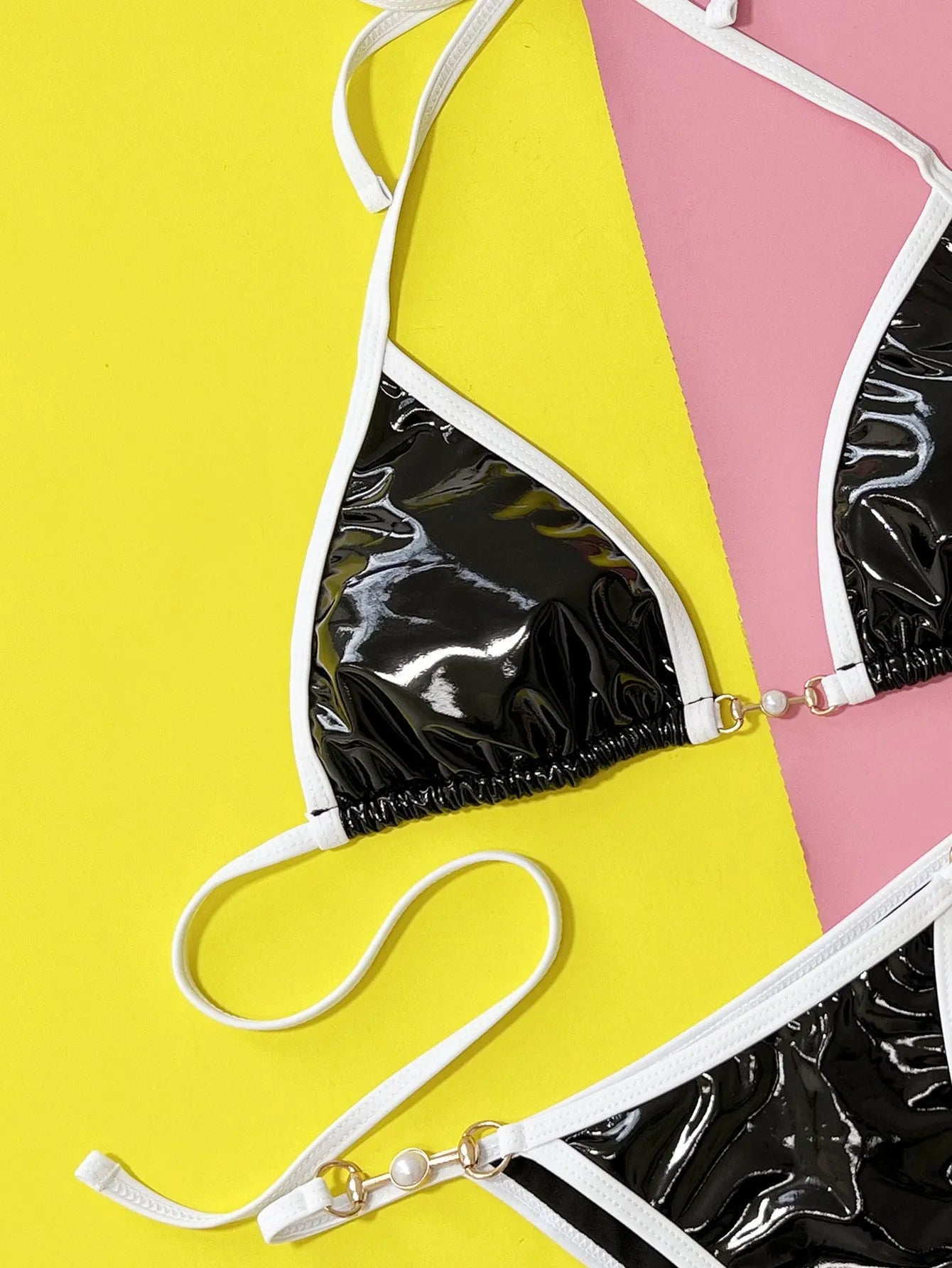 Black solid colour women's split bikini swimsuit with brief style.