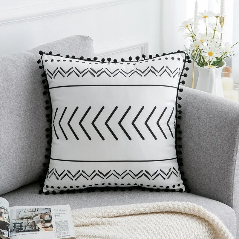 Bohemian style throw pillow on a sofa, available in light grey, black, or white, shown in 45x45cm size.